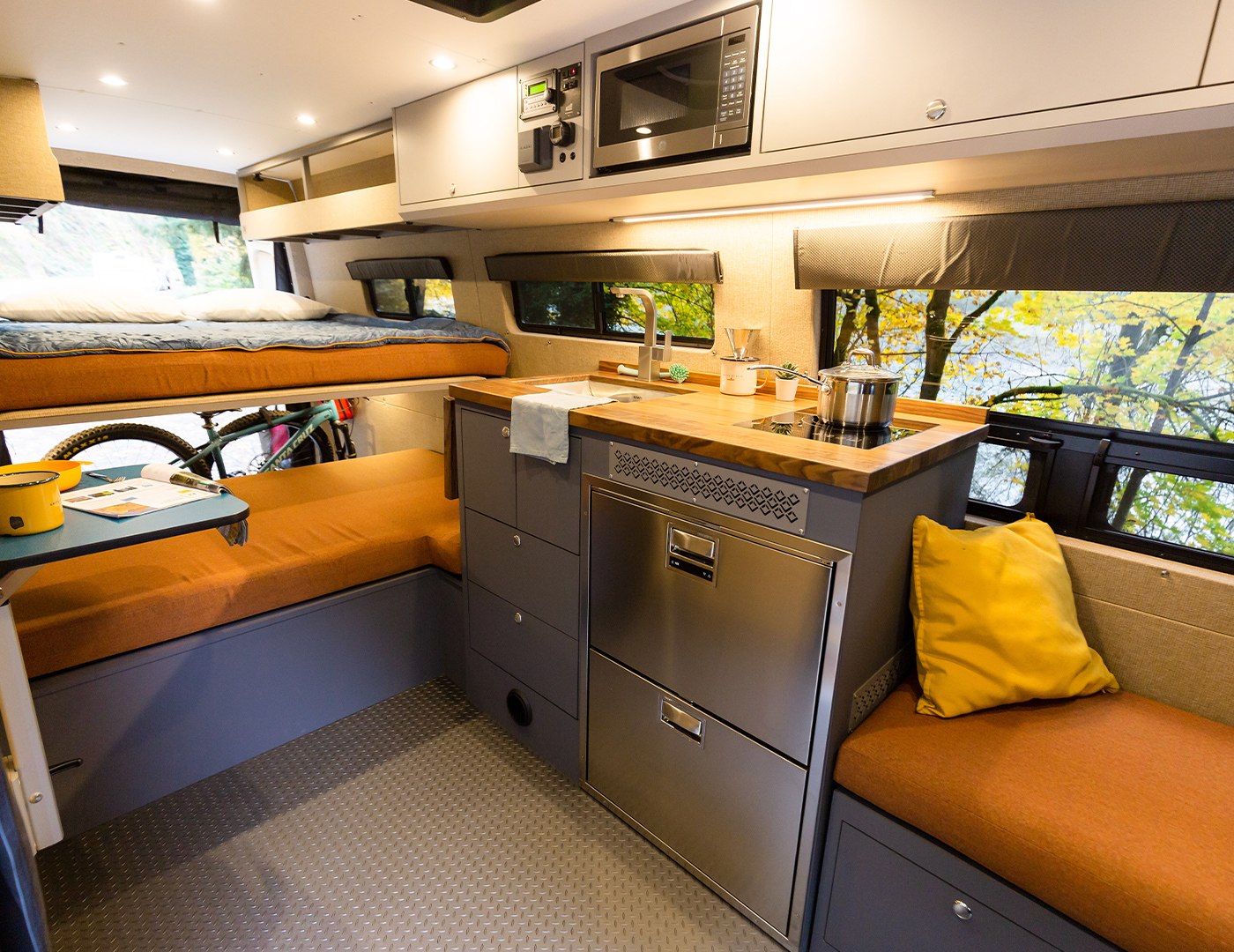 woodside is an Outside van 170 ext custom conversion. great for mountain biking and camping. seating for 3 and sleeping for 2