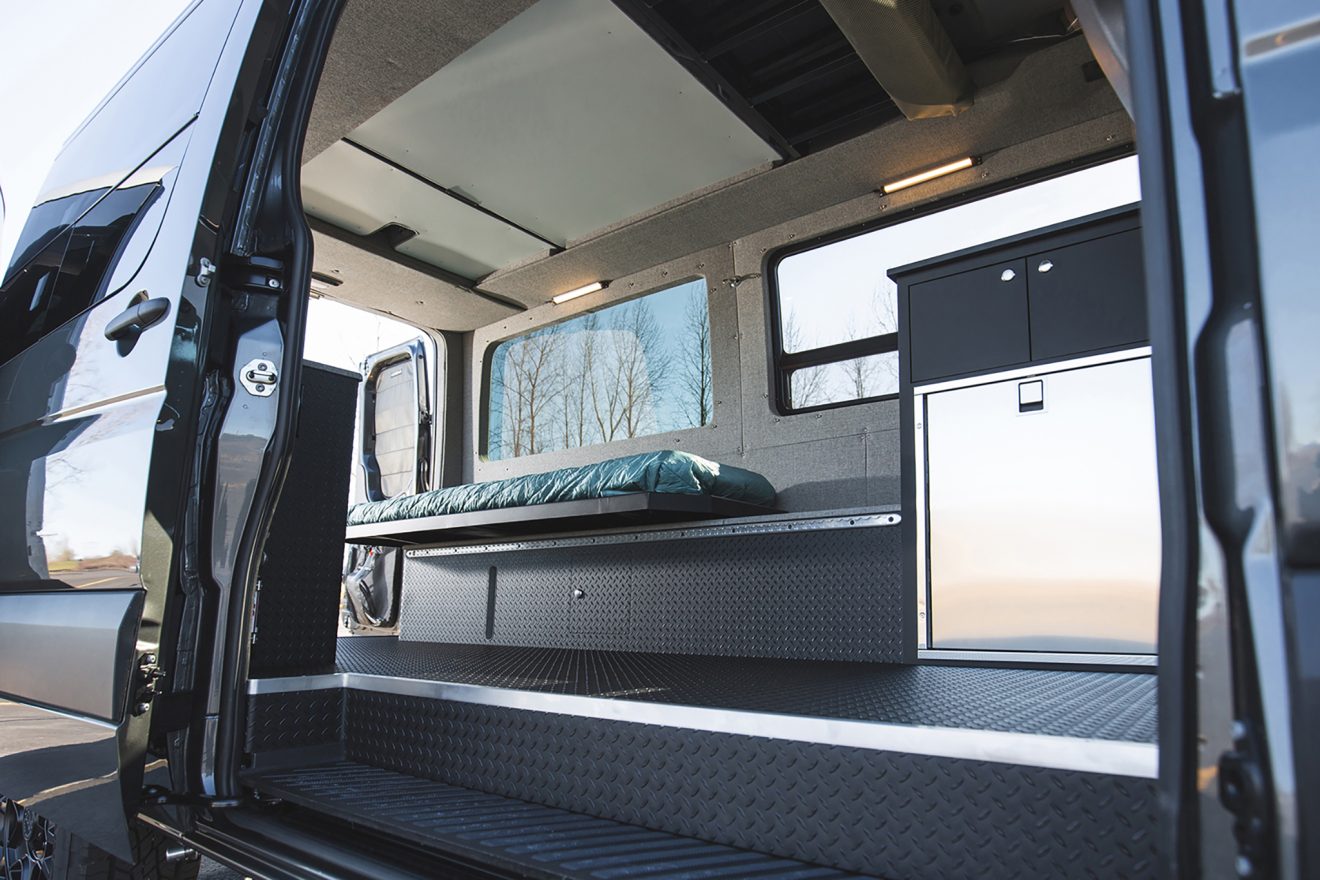 custom van conversion arete 2018 mercedes benz sprinter 144 4wd pop top rooftop tent interior driver side bunk bed