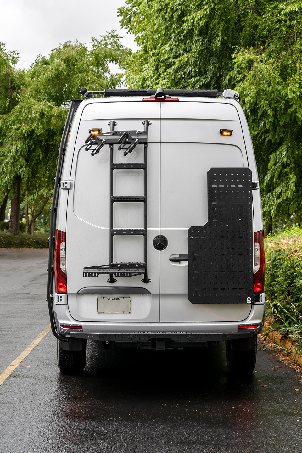 View of rear of the Sprinter van, rear Utility ladder, Owl Sherpa