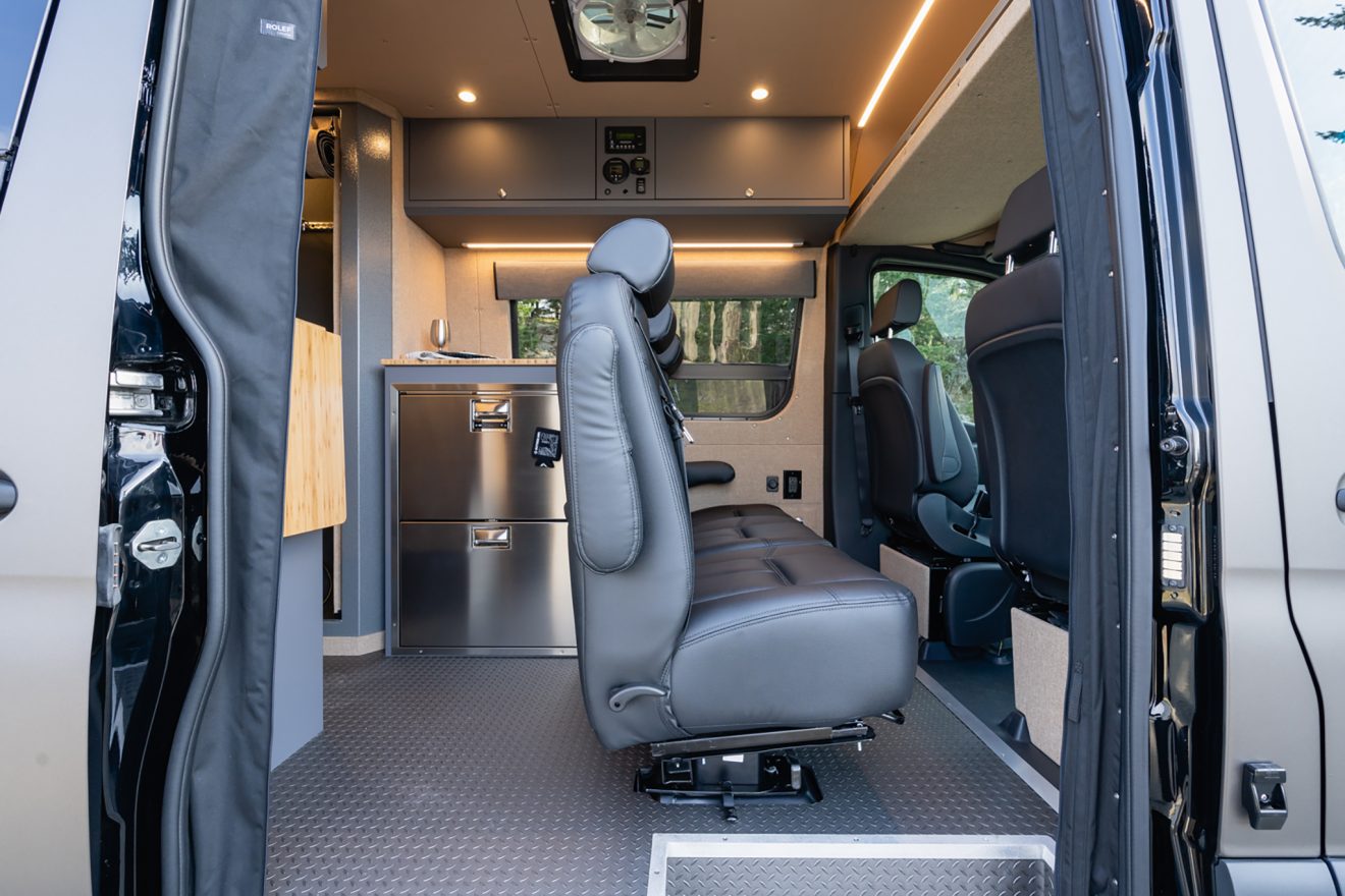 Sprinter 170 EXT open passenger slider door showing trave approved captain's chairs