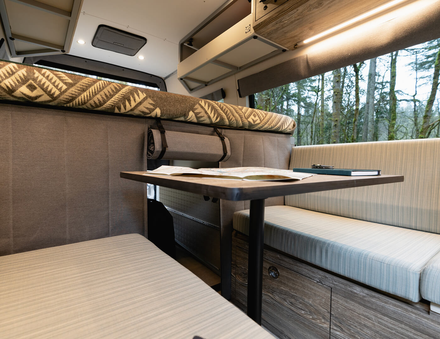 Removable table between dual dinette bench seats