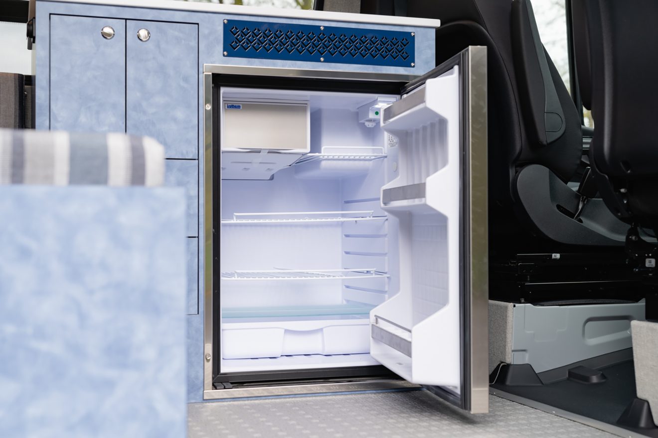 custom van conversion nor’easter 2021 mercedes benz sprinter 144 4wd seat two sleep three interior isotherm refrigerator