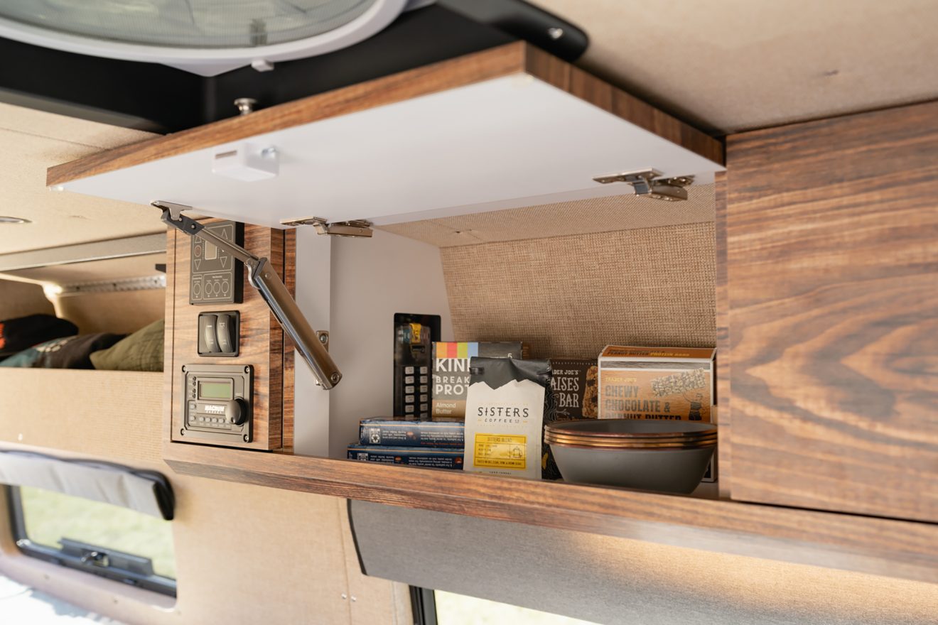 custom van conversion Van Haulin 2021 mercedes benz sprinter 170 4wd seat two sleep three overhead enclosed cabinetry
