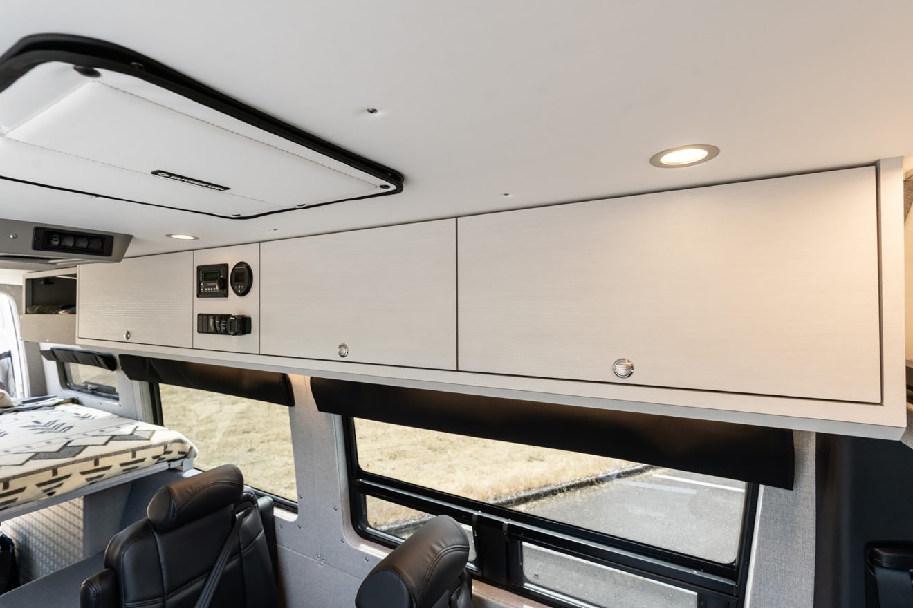 custom van conversion Loma 2021 mercedes benz sprinter 170 4wd seat four sleep three overhead cabinetry