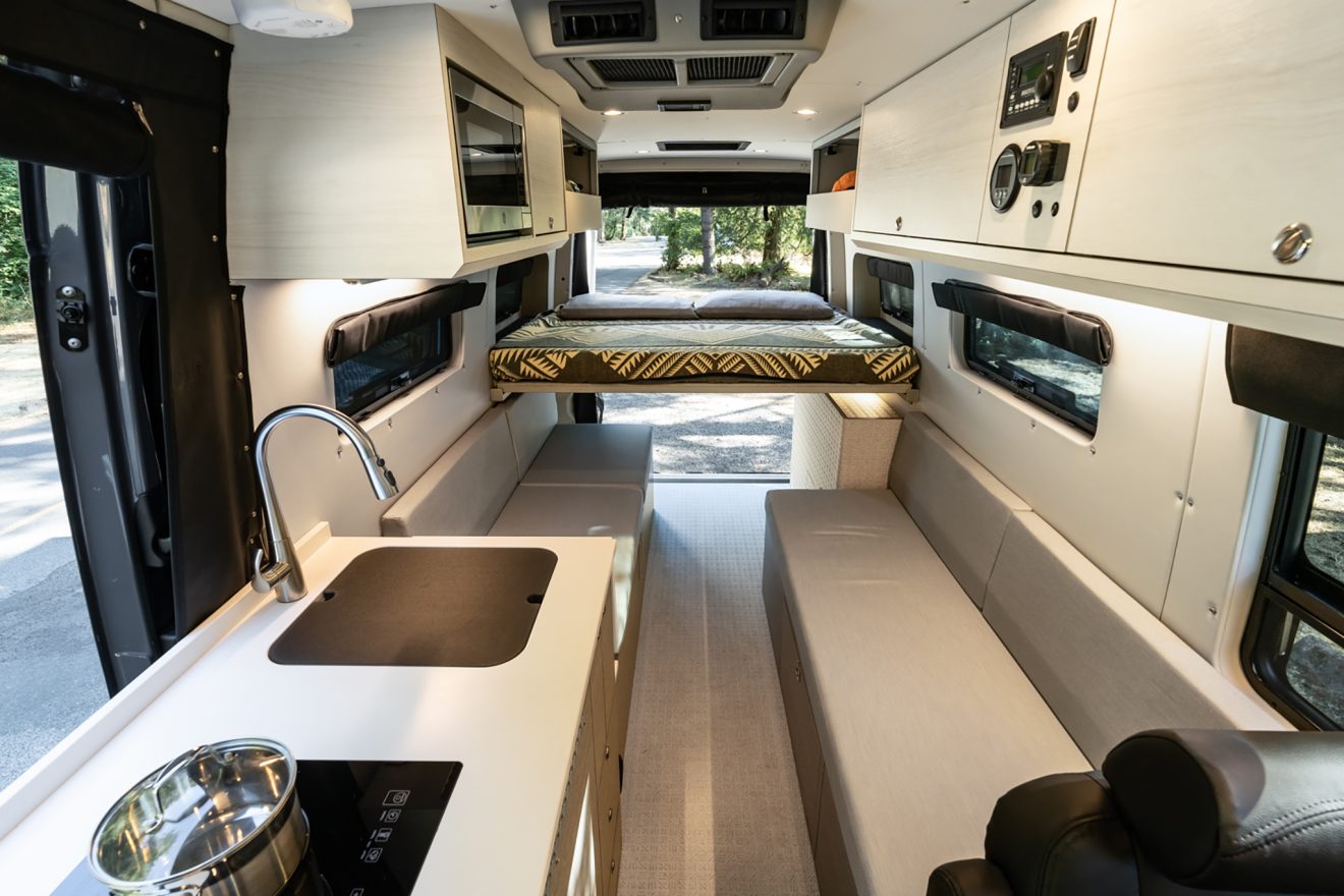 custom van conversion OBI 2022 mercedes benz sprinter 170 4wd seat three sleep three interior cabin galley passenger slider kitchen