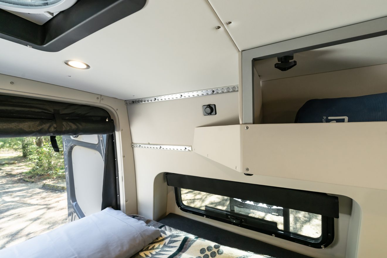 custom van conversion OBI 2022 mercedes benz sprinter 170 4wd seat three sleep three overhead exoskeleton cabinet