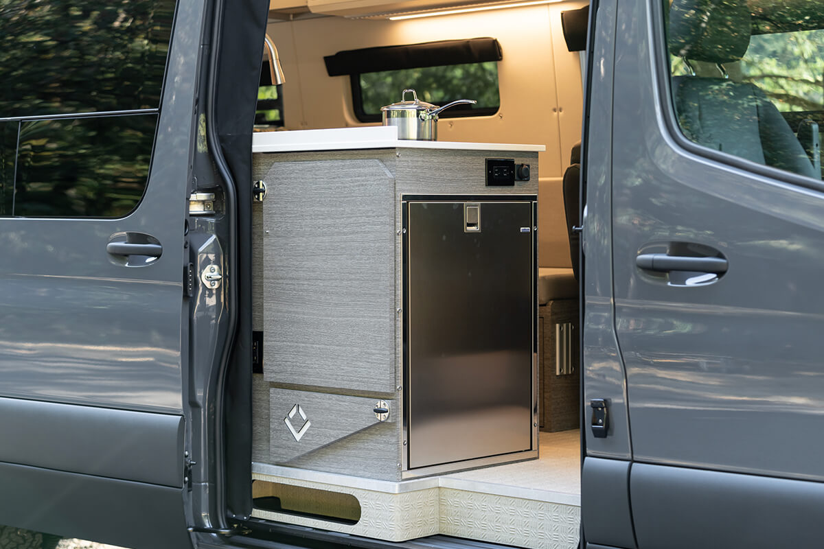 custom van conversion OBI 2022 mercedes benz sprinter 170 4wd seat three sleep three interior cabin