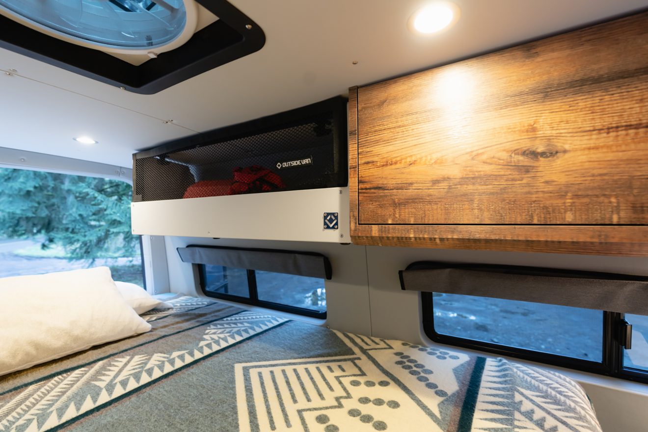 custom van conversion first chair 2020 mercedes benz sprinter 170 4wd seat four sleep four overhead exoskeleton cabinet overhead enclosed cabinetry