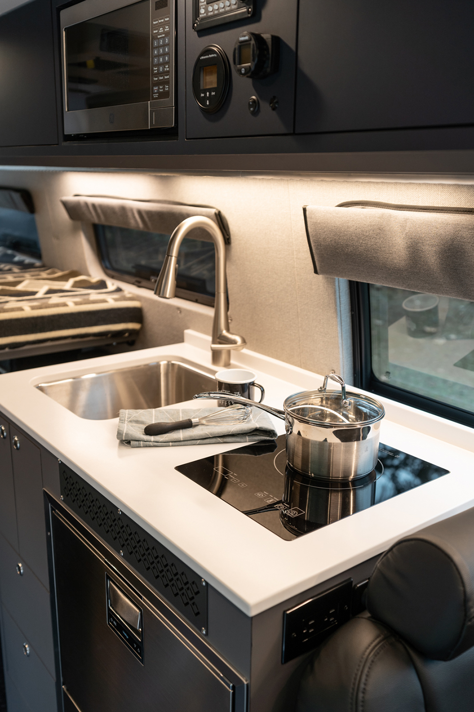 custom van conversion illahee 2021 mercedes benz sprinter 170 4wd dually graphite grey galley kitchen area