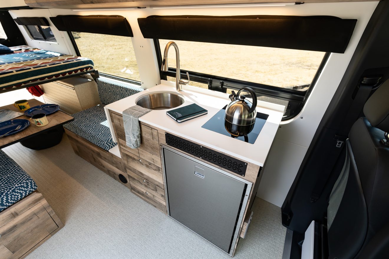 custom van conversion distillation 2022 mercedes benz sprinter 170 4wd seat two sleep three custom galley kitchen