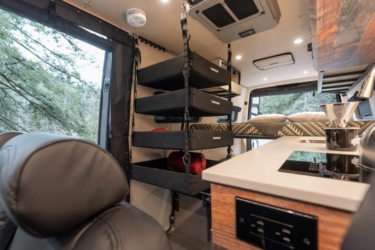 custom conversion ladybug mercedes benz sprinter 170 4wd interior cabin hanging shelves