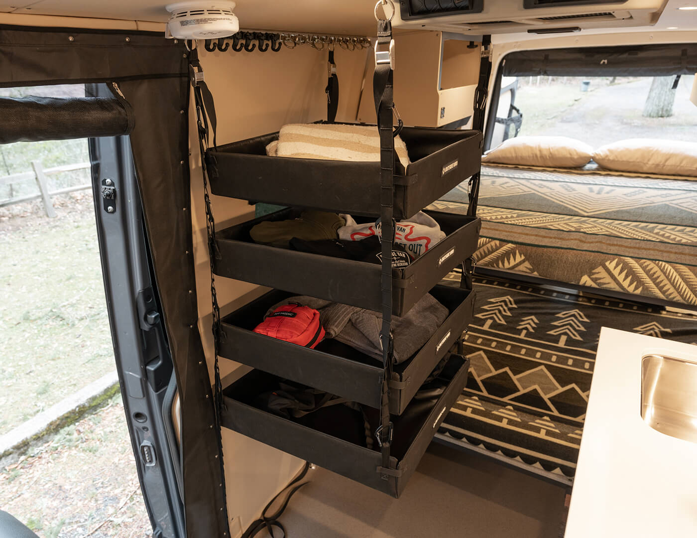 custom conversion ladybug mercedes benz sprinter 170 4wd interior hanging shelves