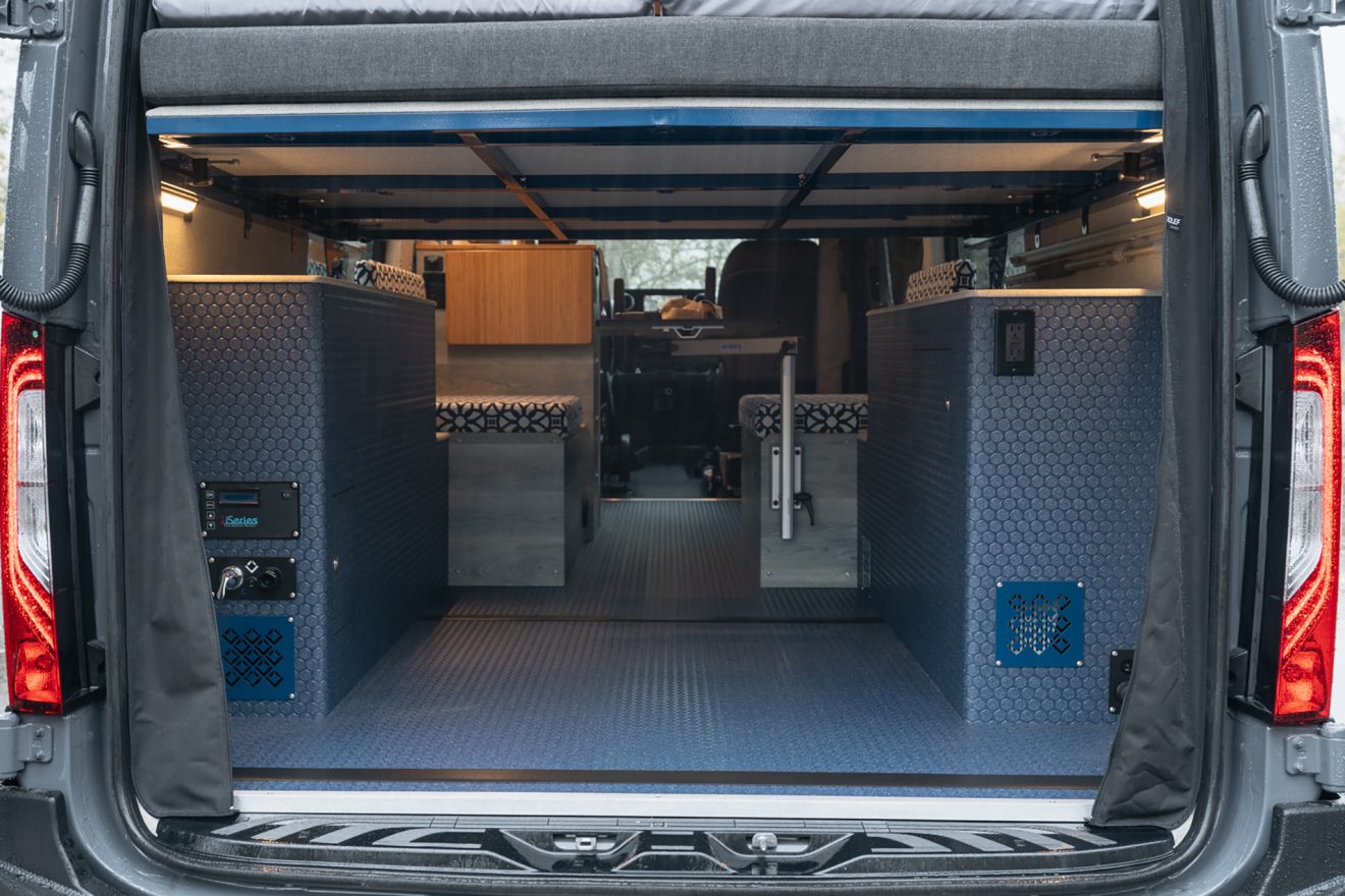 custom van conversion Mellifera Van 2022 mercedes benz sprinter 170 4wd seat two sleep three rear garage interior gear storage