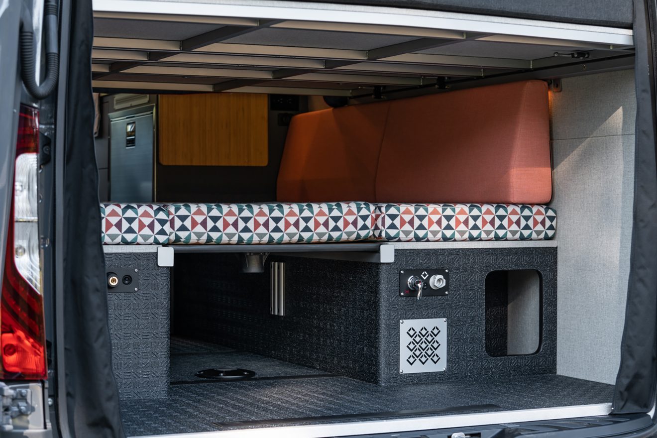 custom van conversion rucksack 2020 mercedes benz sprinter 170 4wd seat three sleep four rear garage lower bed panel