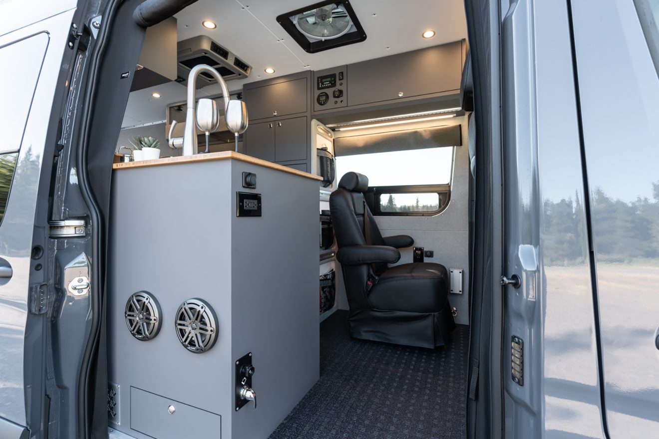 custom van conversion rucksack 2020 mercedes benz sprinter 170 4wd seat three sleep four galley passenger slider kitchen