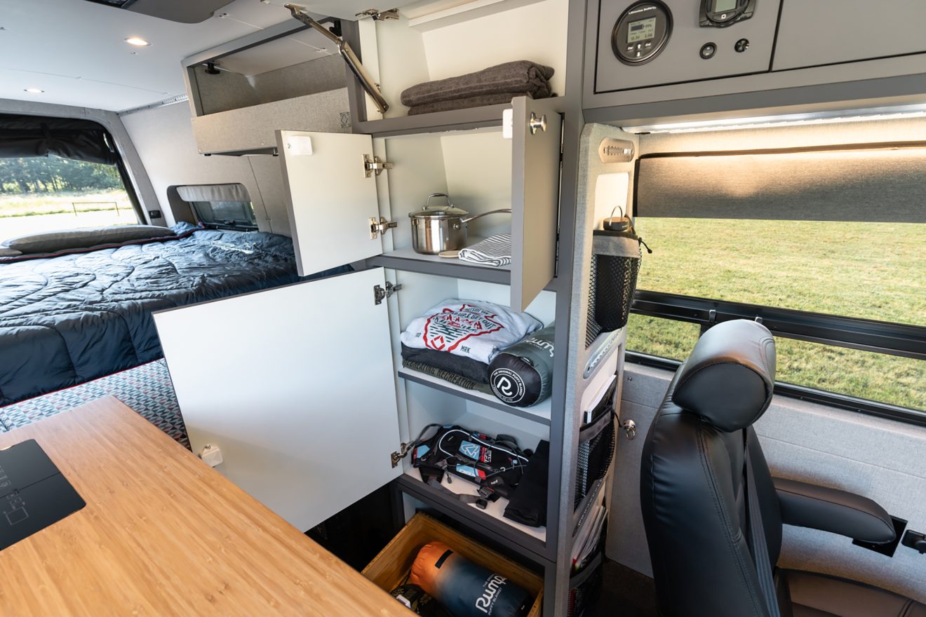 custom van conversion rucksack 2020 mercedes benz sprinter 170 4wd seat three sleep four interior storage cabinet