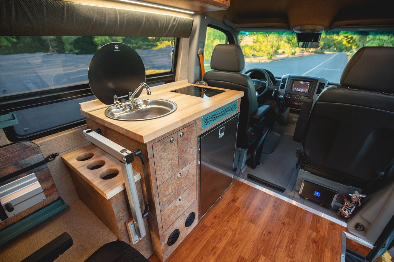 custom van conversion timiled 2018 mercedes benz sprinter 144 4wd seat four sleep three interior galley kitchen sink
