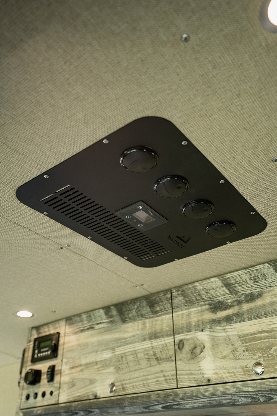 Overhead ceiling vent and overhead cabinetry