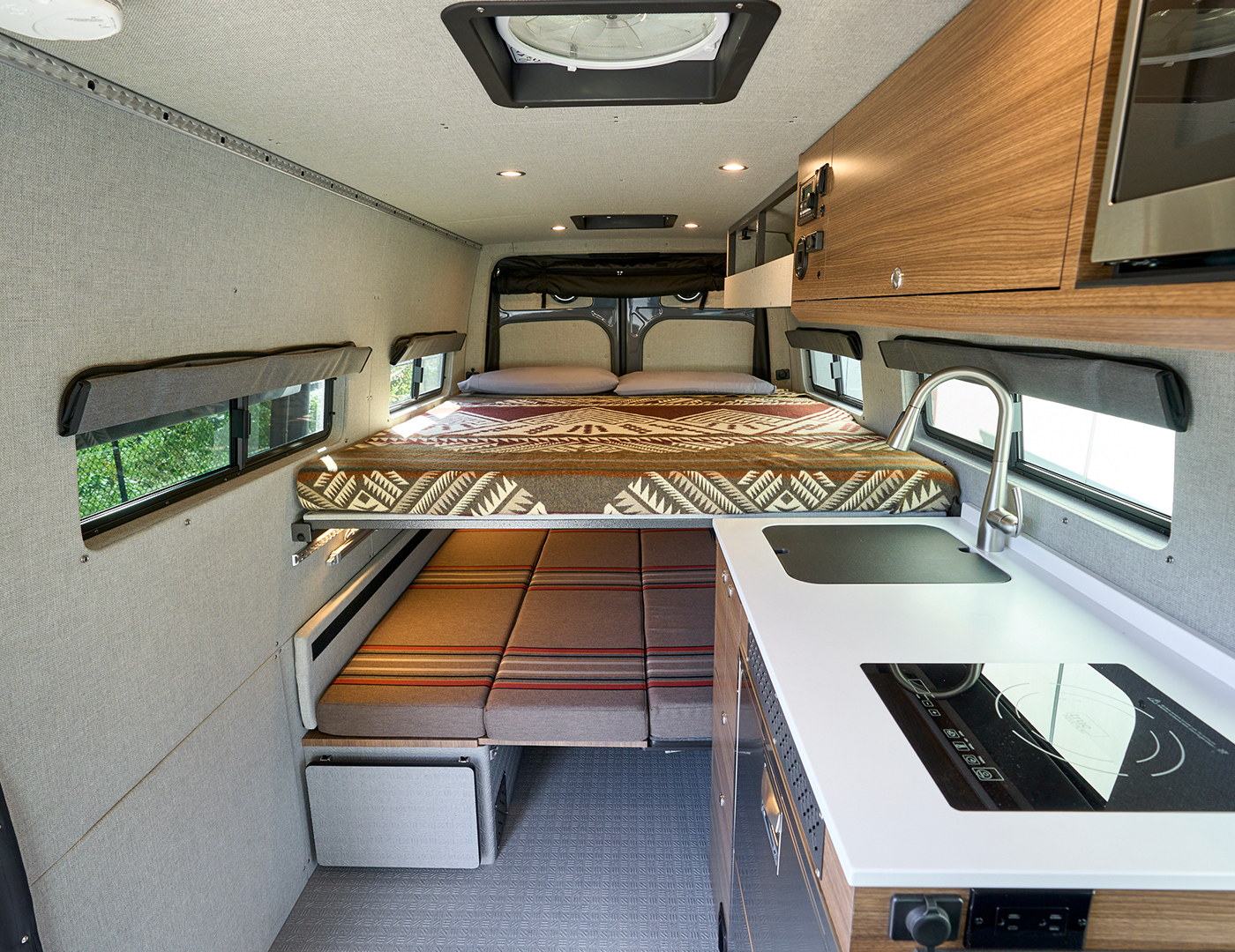 Custom off-road conversion van with desk and mobile office by Outside Van