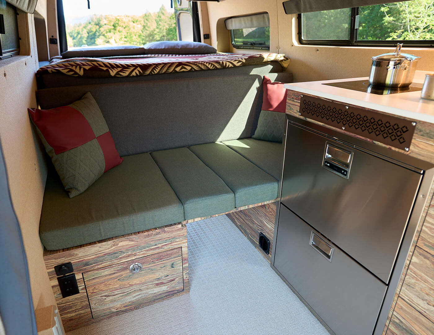 Freehand by Outside Van is a custom converted 170 Mercedes Sprinter with couch and shower