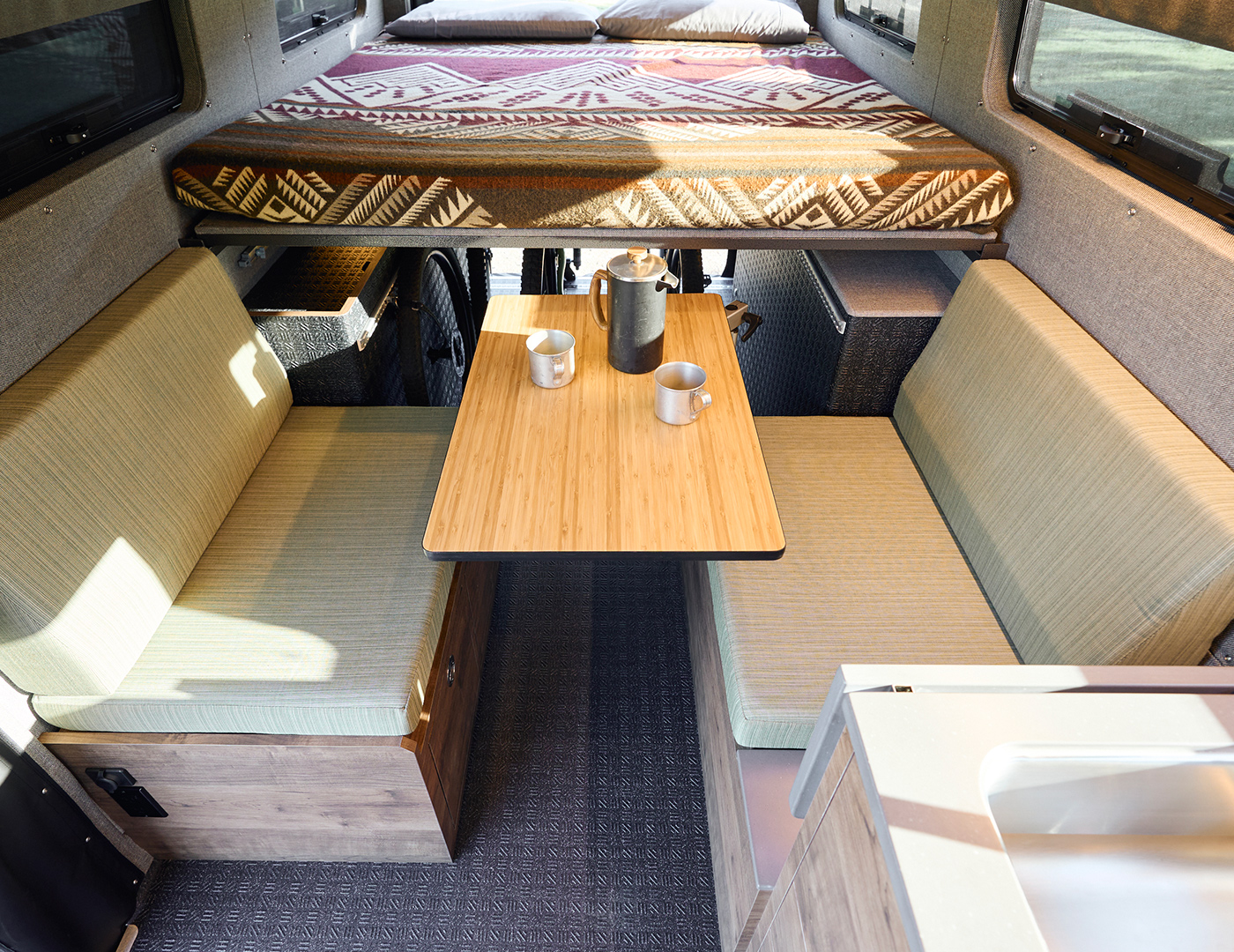 Cuckoo's Nest is a custom sprinter van with kitchen and dining area built by Outside Van in Portland Oregon