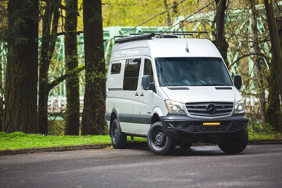 camping in a 144" Outside Van custom conversion great for camping, seating for 5 and sleeping for 2